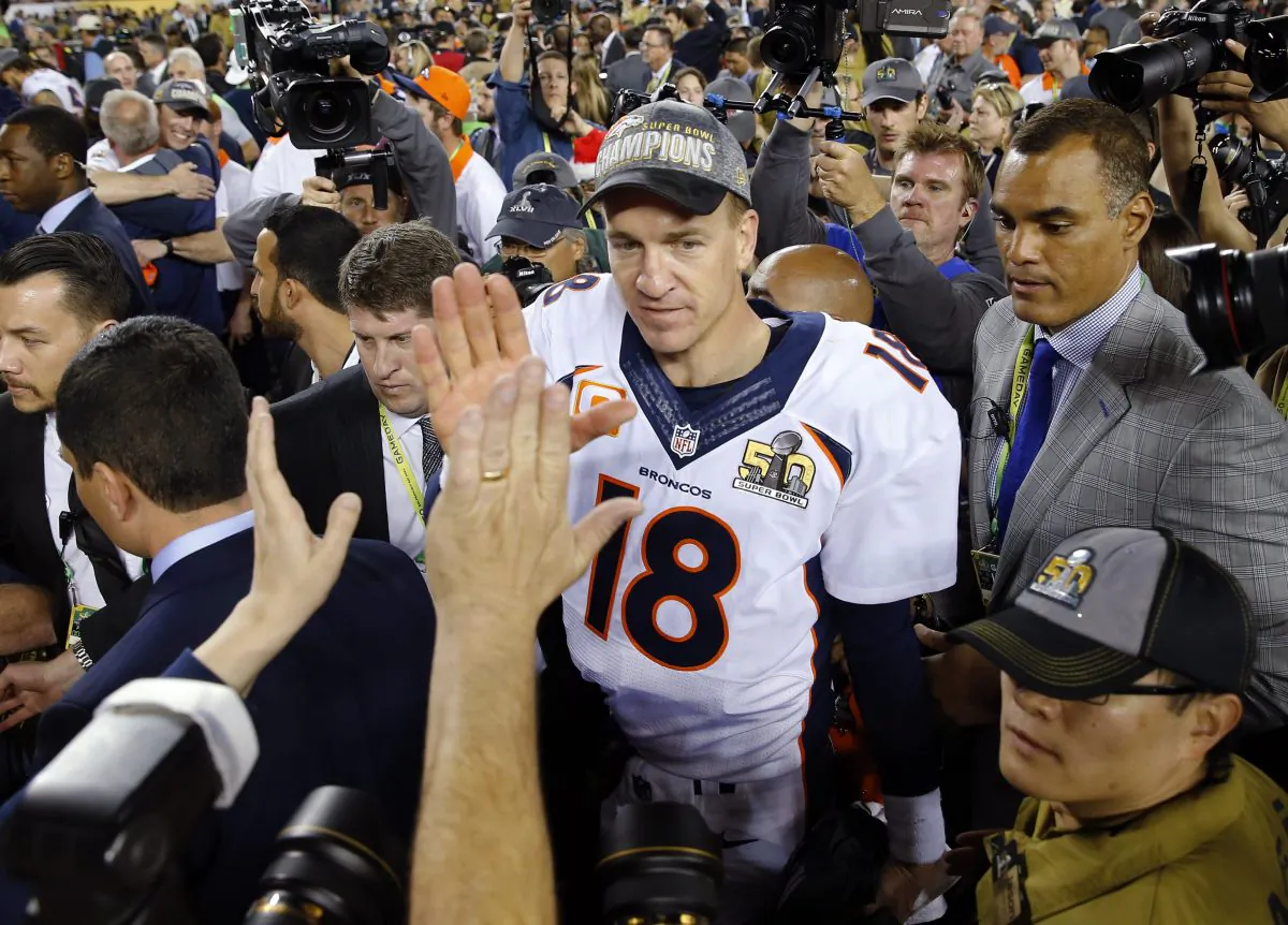 Denver Broncos Peyton Manning (18) leaves the field after winning the NFL Super Bowl 50 football game against the Carolina Panthers Sunday, Feb. 7, 2016, in Santa Clara, Calif. The Broncos won 24-10. (AP Photo/Matt York)