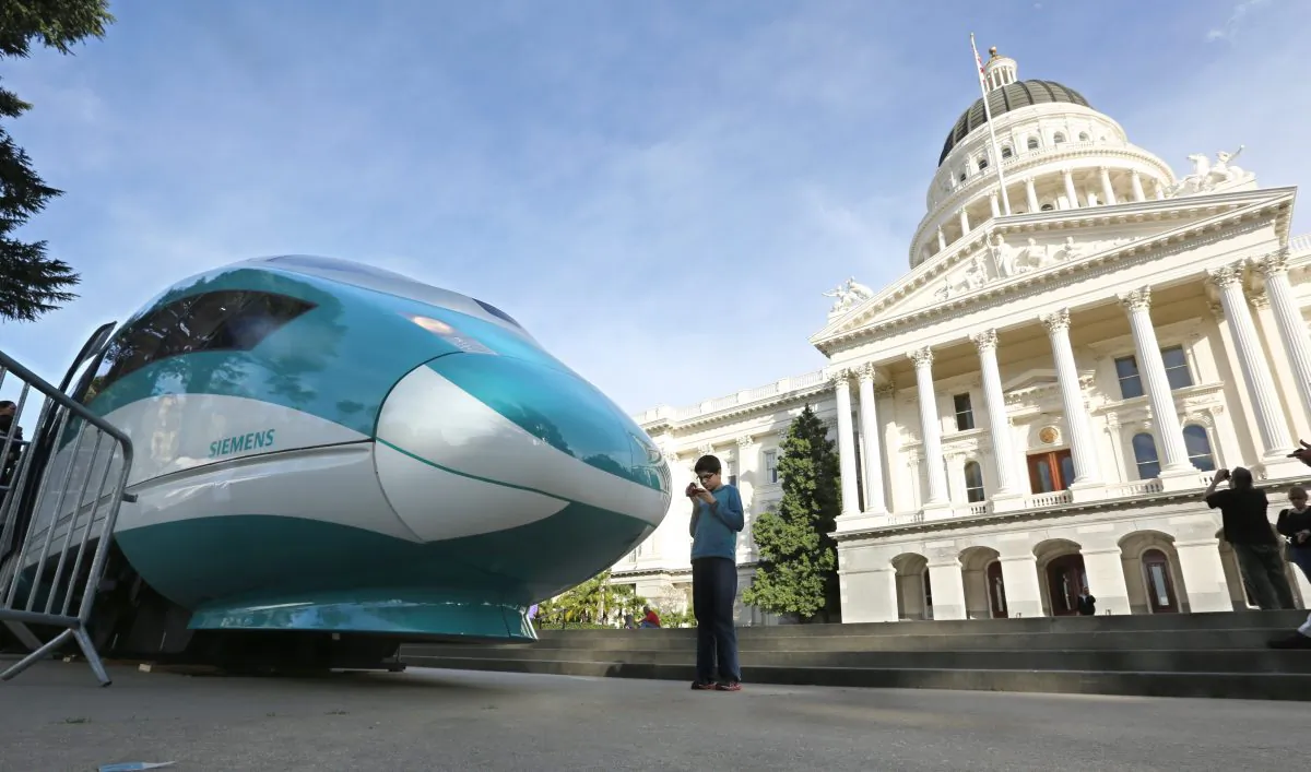 In this file photo, a full-scale mock-up of a high-speed train is displayed at the Capitol in Sacramento, Calif., on Feb. 26, 2015. (Rich Pedroncelli/AP Photo)