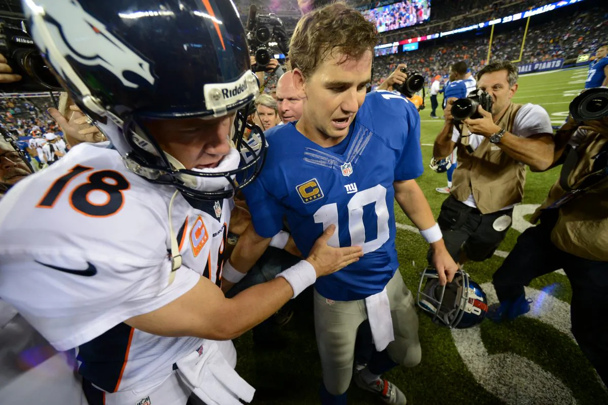 Peyton Manning (L) and Eli Manning both have won a pair of Super Bowls. (Ron Antonelli/Getty Images) 