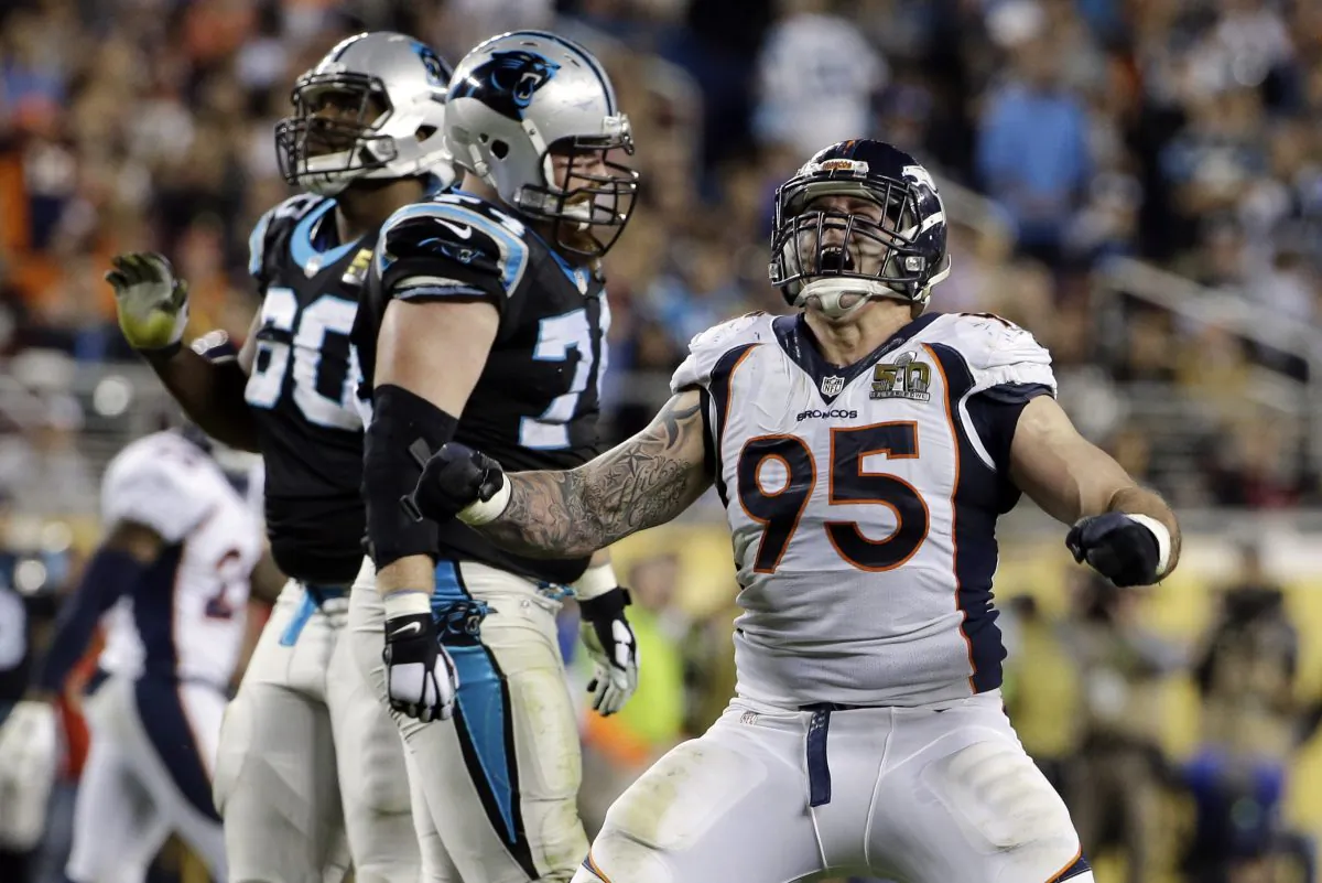 Denver Broncos Derek Wolfe (95) celebrates after sacking Carolina Panthers Cam Newton (1) during the second half of the NFL Super Bowl 50 football game in Santa Clara, Calif., on Feb. 7, 2016. (AP Photo/Jeff Chiu)