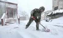 New England Mops up as Snow Falls on East Coast