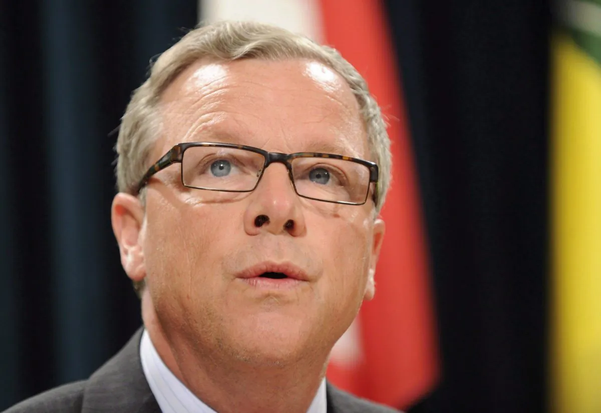 Saskatchewan Premier Brad Wall addresses a news conference in Regina on Jan. 23, 2016. The Saskatchewan government is proposing to have oil and gas workers who have lost their jobs clean up abandoned wells. (THE CANADIAN PRESS/Mark Taylor)