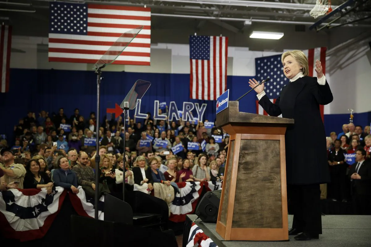 FILE - In this Feb. 9, 2016 file photo, Democratic presidential candidate Hillary Clinton speaks in Hooksett, N.H. Clinton is staking her campaign comeback hopes on her ability to woo black and Latino voters, placing outreach to them at the center of her strategy to retool her 2016 bid. (AP Photo/Matt Rourke, File)