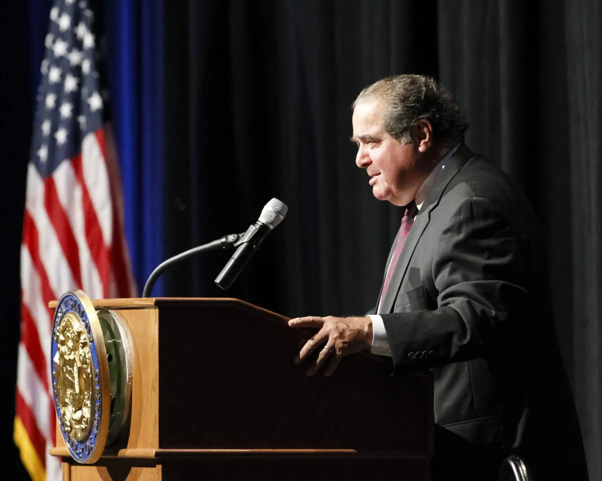U.S. Supreme Court Justice Antonin Scalia gives the keynote speech at the Snake River Adjudication celebration dinner at the Boise Center on the Grove in Boise, Idaho, on Aug. 25, 2014. (AP Photo/Otto Kitsinger)
