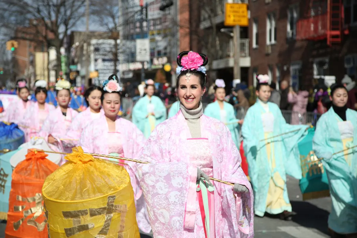 Falun Gong practitioners take part in the Chinese Lunar New Year parade in Flushing, Queens, N.Y., on Feb. 13, 2016. (Benjamin Chasteen/Epoch Times)