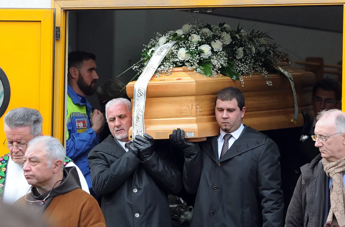 People carry the coffin of Giulio Regeni, a Cambridge University PhD student who was found dead bearing signs of torture after disappearing in Cairo last month, after the ceremony during his funeral in Fiumicello on February 12, 2016. (DIEGO PETRUSSI/AFP/Getty Images)