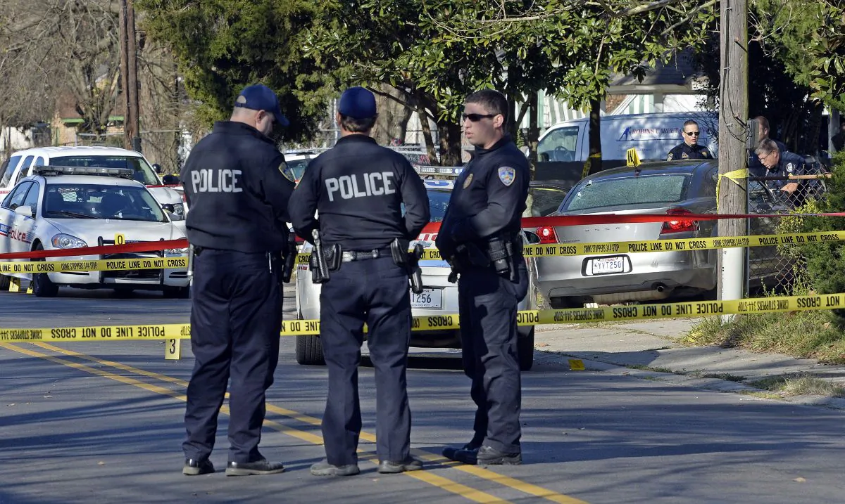 Officers investigate the scene of a shooting in Baton Rouge, La., on Feb. 13, 2016. (Bill Feig/AP Photo)
