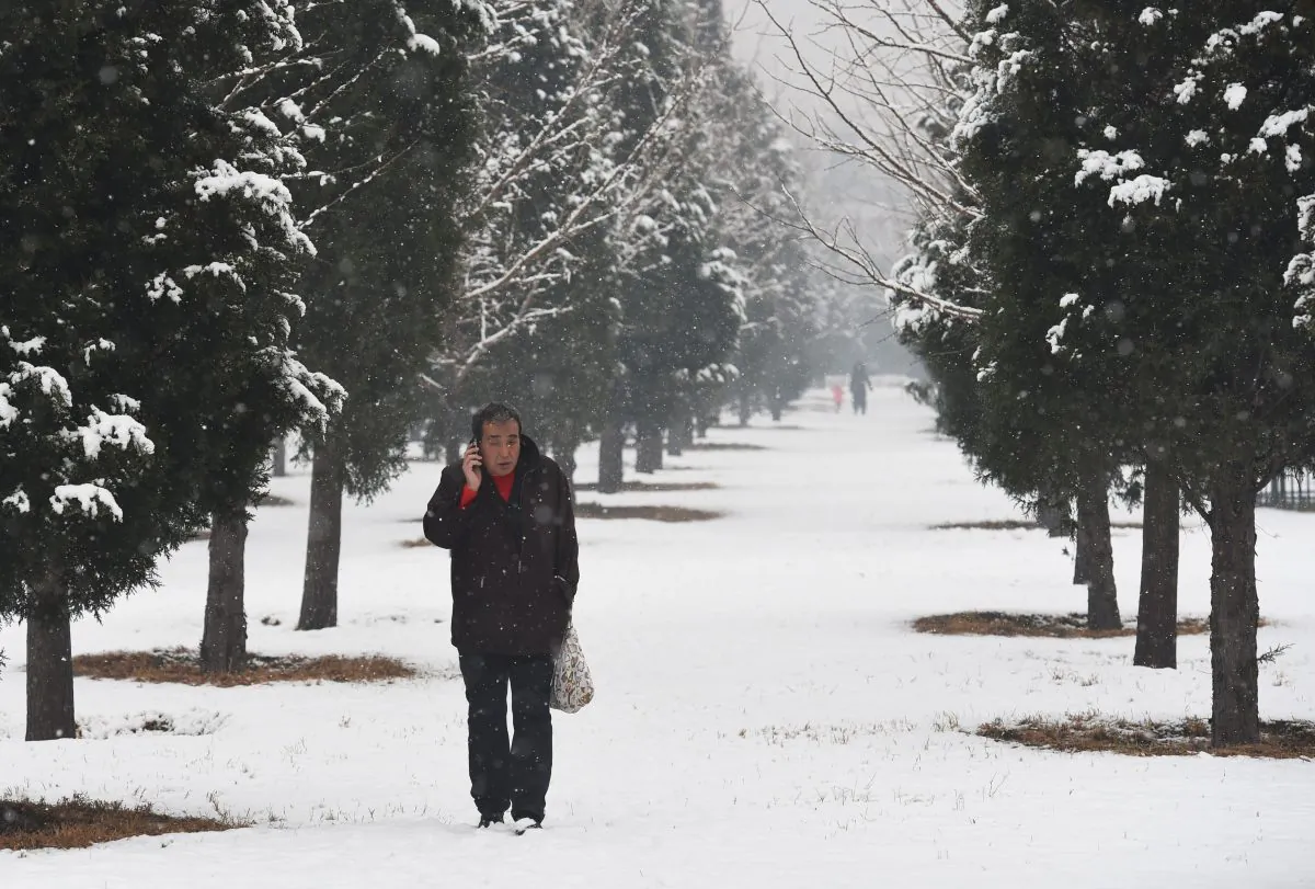 Snow in China didn’t make it cold enough to turn on heaters in Shandong. (Greg Baker/AFP/Getty Images)