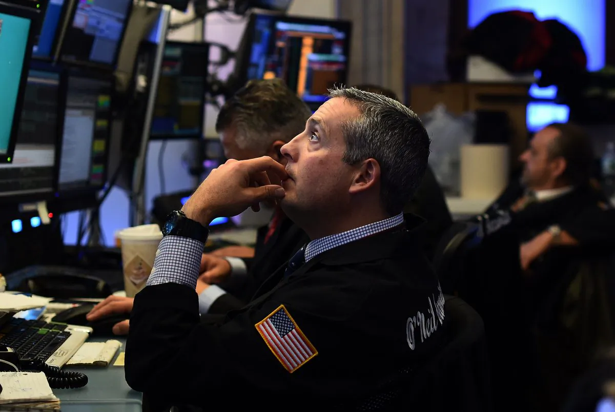Traders work on the floor of the New York Stock Exchange (NYSE) in New York on Oct. 17, 2014. (Jewel Samad/AFP/Getty Images)