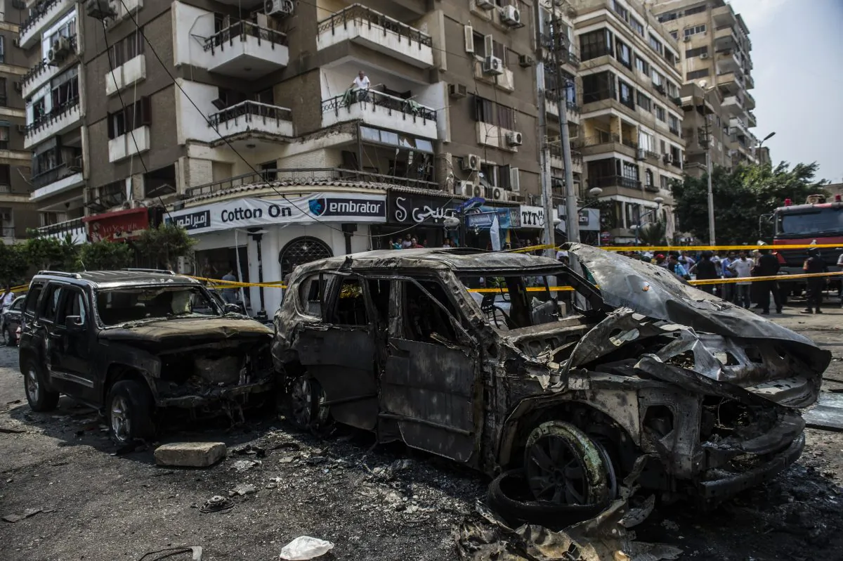 Burnt-out vehicles are seen at the site of a bomb attack that targeted the convoy of the Egyptian State Prosecutor Hisham Barakat, who died hours after the powerful explosion hit his convoy, in Cairo, Egypt, on June 29, 2015. The bombing came after the Islamic State's affiliate in Egypt called for attacks on the judiciary following the hanging of six alleged militants. (Khaled Desouki/AFP/Getty Images)