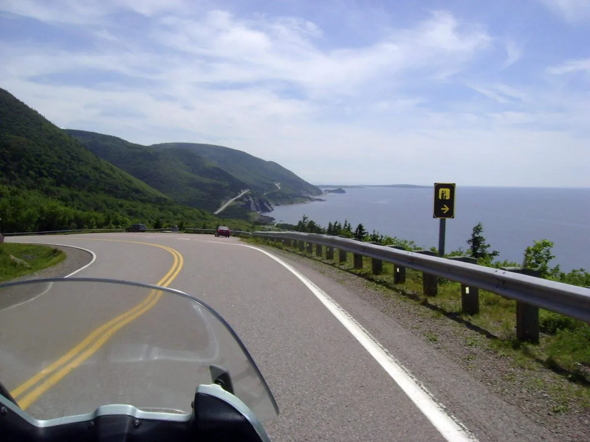 The road along the Cabot Trail in Cape Breton, Nova Scotia. A Cape Breton man who put together a website encouraging Americans to move to Cape Breton if Donald Trump is elected is receiving lots of enquiries about the island. (THE CANADIAN PRESS/AP-Glenn Adams)