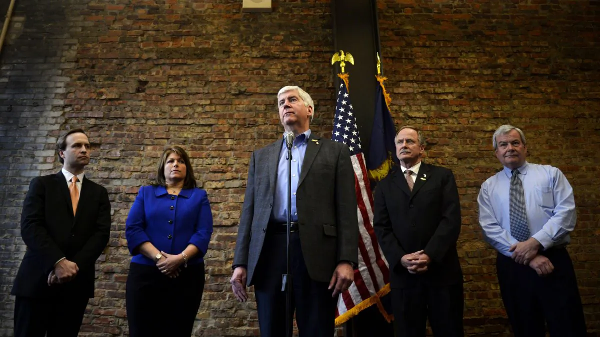 Gov. Rick Snyder at a press conference at Rowe Professional Services in Flint, Mich., on Feb. 17, 2016. Snyder announced next steps to identify and replace high-risk, high-priority pipes in Flint. Rowe Professional Services will be conducting tests to determine where replacement pipes should be installed. Flint is under a state of emergency because corrosive water was allowed to leach lead from pipes into the supply. (Rachel Woolf/The Flint Journal-MLive.com via AP)