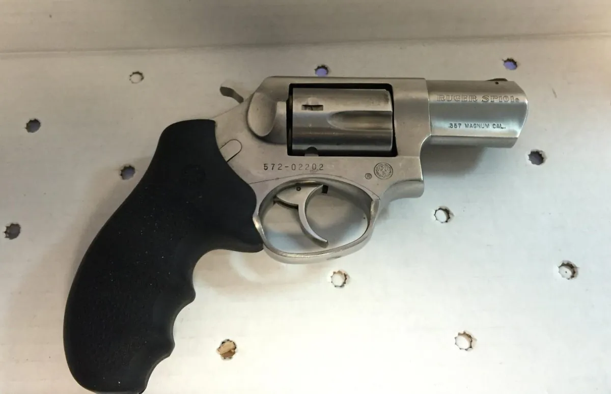 A revolver that was found in the front seat of a suspect, who crashed his car into a police vehicle, Saturday, Feb. 20, 2016 in New York. Two New York City Police officers were injured in a shootout with the suspect, Jamal Funes, early Saturday. Funes, was shot multiple times and was in critical condition at Brookdale Hospital, Police Commissioner William Bratton said. (Photo provided by NYPD)