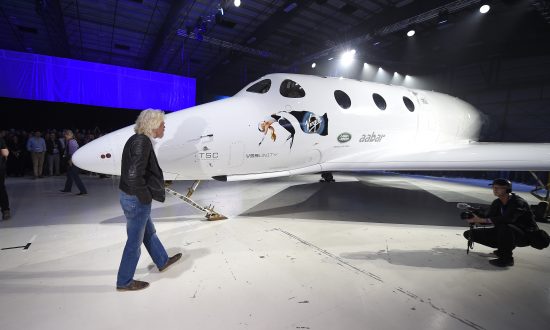 Virgin Galactic Rolls out New Space Tourism Rocket Plane