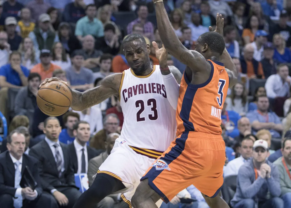 LeBron James has won four MVPs and two NBA titles in his career. (J. Pat Carter/Getty Images)
