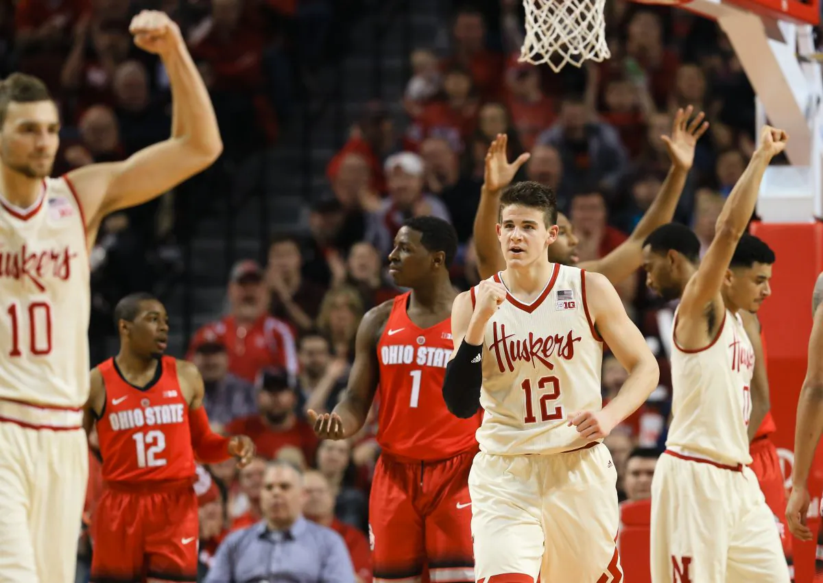 Nebraska's Michael Jacobson (C), Jack McVeigh (L) and Tai Webster (R) rallied to take Ohio State to overtime but fell 65–62 in the extra session. (AP Photo/Nati Harnik) 