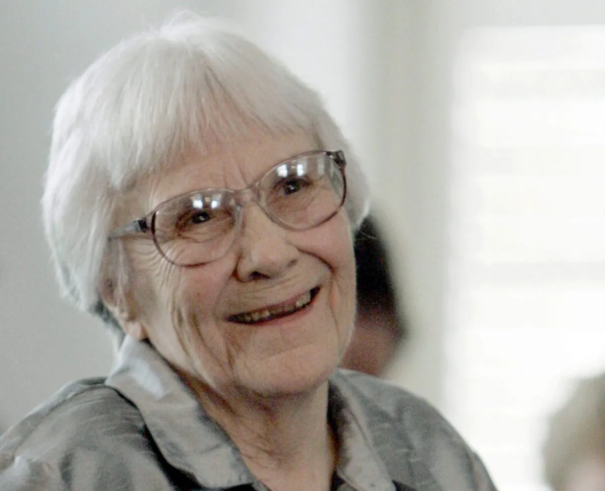 In this Aug. 20, 2007, file photo, author Harper Lee smiles during a ceremony honoring the four new members of the Alabama Academy of Honor at the Capitol in Montgomery, Ala. Lee, elusive author of best-seller "To Kill a Mockingbird," died Friday, Feb. 19, 2016, according to her publisher, Harper Collins. She was 89. (AP Photo/Rob Carr, File)