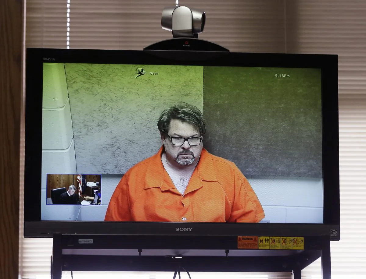 Jason Dalton, of of Kalamazoo Township, Mich., is arraigned via video before Judge Christopher T. Haenicke in Kalamazoo, Mich., on Feb. 22, 2016. Dalton is charged with multiple counts of murder in a series of random shootings in western Michigan. (AP Photo/Carlos Osorio)
