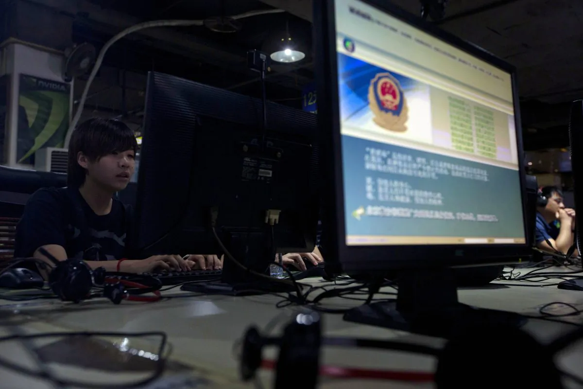 A computer displays a message from the Chinese Great Firewall on the proper use of the internet at an internet cafe in Beijing. (Ng Han Guan, File /AP Photo)