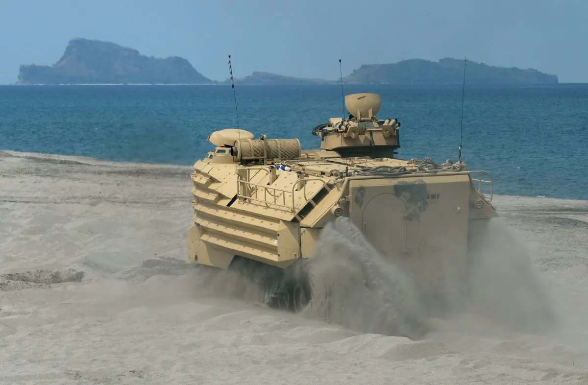 A U.S. Marine amphibious assault vehicle overlooks the water in San Antonio in Zambales province on April 21, 2015, during a military training with the Philippines 137 miles east of the Scarborough Shoal in the South China Sea. Tensions over the South China Sea are reaching a new level. (Ted Aljibe/AFP/Getty Images)