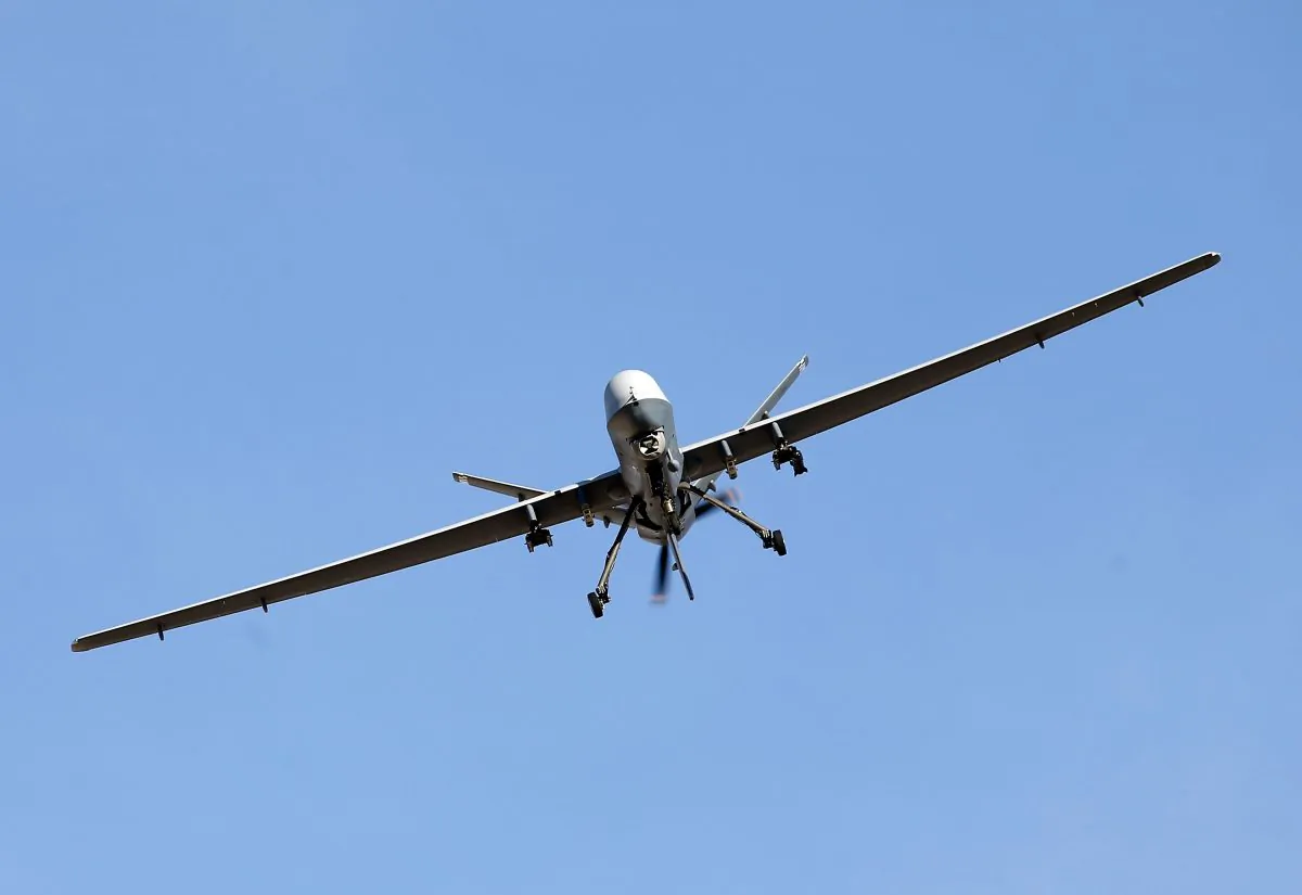 An MQ-9 Reaper remotely piloted aircraft (RPA) flies by during a training mission at Creech Air Force Base in Indian Springs, Nev., on Nov. 17, 2015. (Isaac Brekken/Getty Images)