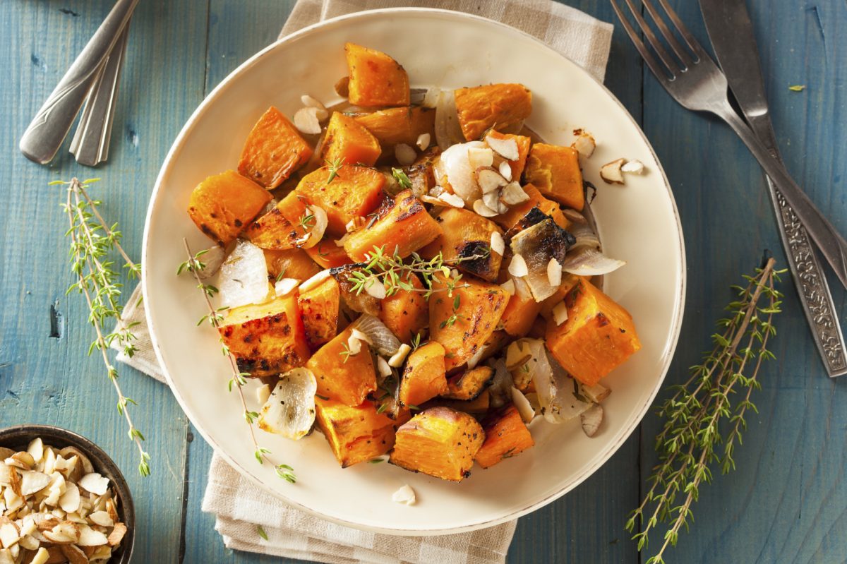 Homemade Cooked Sweet Potato with Onions and Herbs (bhofack2/iStock)