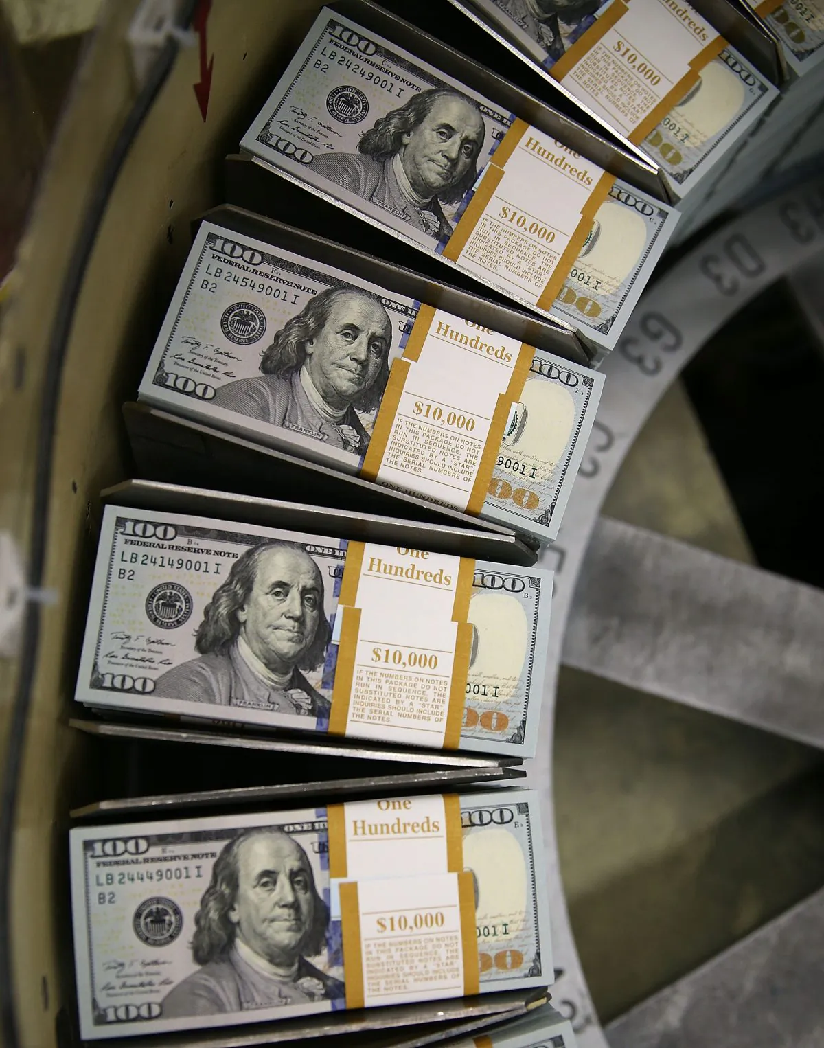 Newly redesigned $100 notes are printed at the Bureau of Engraving and Printing in Washington, D.C., on May 20, 2013. (Mark Wilson/Getty Images)