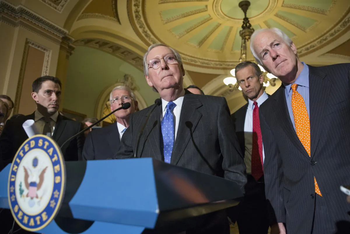 Senate Majority Leader Mitch McConnell (R-Ky.) (C), joined by (from 2L) Sen. Roger Wicker (R-Miss.), Sen. John Thune (R-S.D.), and Senate Majority Whip John Cornyn (R-Texas), speaks with reporters on Capitol Hill in Washington, D.C., on Feb. 23, 2016, following a closed-door policy meeting. (AP Photo/J. Scott Applewhite)
