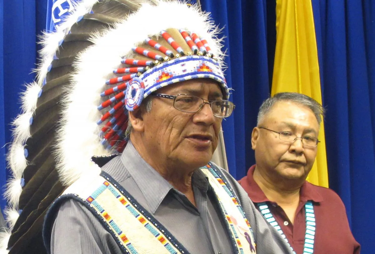 FILE - In this Sept. 17, 2015 file photo Oglala Sioux President John Yellow Bird Steele speaks during a news conference at the U.S. Attorney's Office in Albuquerque, N.M. A judge on Tuesday, Feb. 23, 2016, has approved a nearly $1 billion settlement between the Interior Department and Native American tribes over a decades-old claim that the government inadequately compensated tribes while they managed education, law enforcement and other federal services. (AP Photo/Mary Hudetz, File)