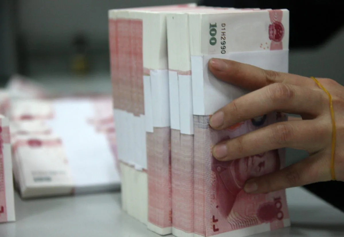 Chinese yuan notes at a branch of the Industrial and Commercial Bank of China (ICBC), on March 14, 2011 in Huaibei, China. The Chinese government is now spending up to 15 percent of GDP on fiscal stimulus. (ChinaFotoPress/Getty Images)