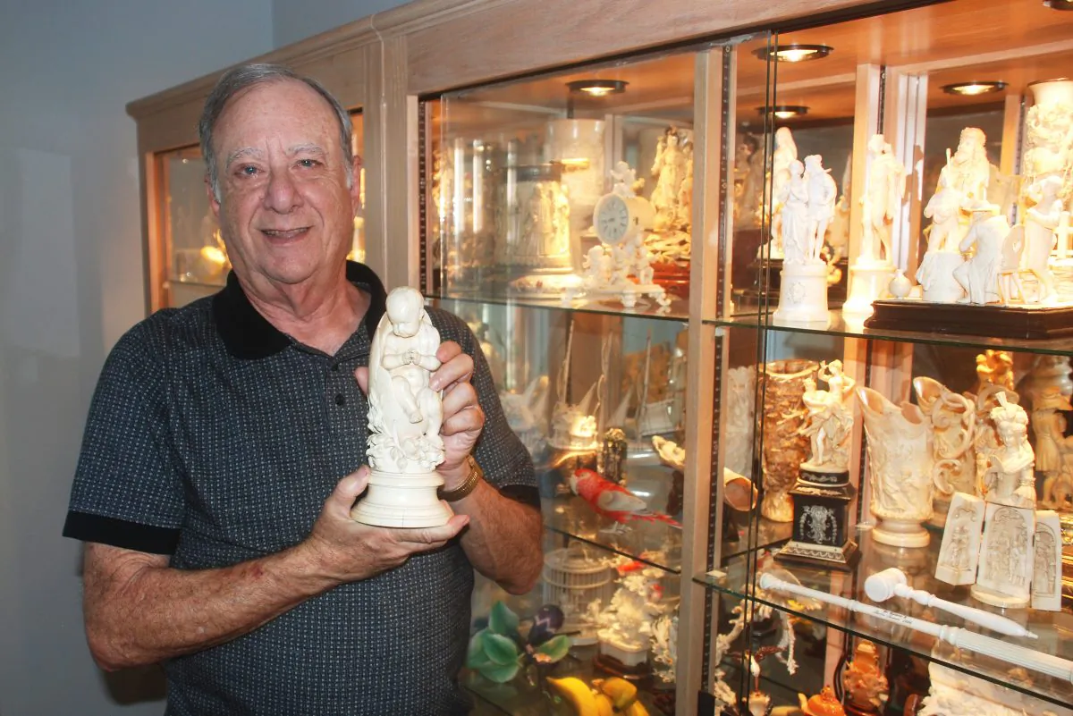 Bob Weisblut with some of the pieces in his ivory collection at his home in Ocean Ridge, Fla. (John Christopher Fine)