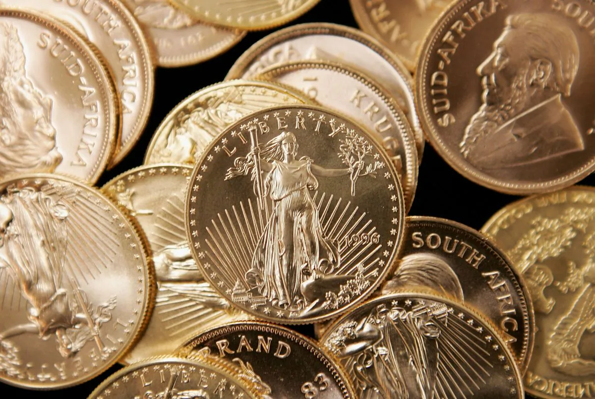 American Eagle and South African Krugerrand gold bullion at the Chicago Coin Company in Chicago, Ill., on May 11, 2006. Monetary Metals, Inc. wants to make gold useful in the economy again. (Scott Olson/Getty Images)
