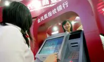 Tricked Into Making a $400 Transaction, Chinese Woman Uses Coke to Destroy ATM