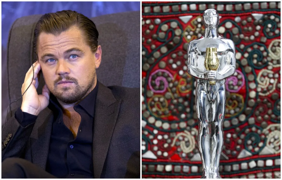Leonardo DiCaprio and the Oscar that fans of him in Russia's Yakutia region have made for him. (AP Photo/Rebecca Blackwell, Roman Kutukov)