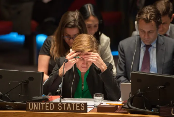 United States Ambassador to the United Nations Samantha Power reads before a vote to support a United Nations resolution endorsing a cease-fire in Syria, Friday, Feb. 26, 2016 at United Nations headquarters. (AP Photo/Bryan R. Smith)