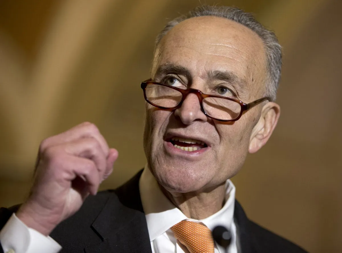 Sen. Charles Schumer (D-N.Y.) talks to media on Capitol Hill in Washington, D.C., on Oct. 20, 2015. Schumer wants to require the Federal Aviation Administration to establish seat-size standards for commercial airlines, which he says now force passengers to sit on planes "like sardines." (AP Photo/Carolyn Kaster)