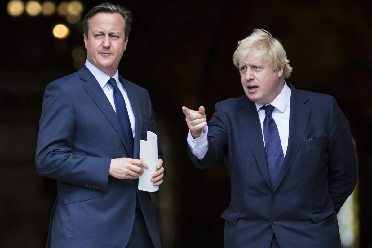 British Prime Minister David Cameron (L) and London Mayor Boris Johnson leave St. Paul's Cathedral in central London on July 7, 2015. (Jack Taylor/AFP/Getty Images)