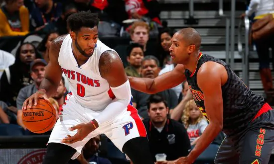 Andre Drummond: Detroit Pistons Center Talks to Young Fan on Bench During Game