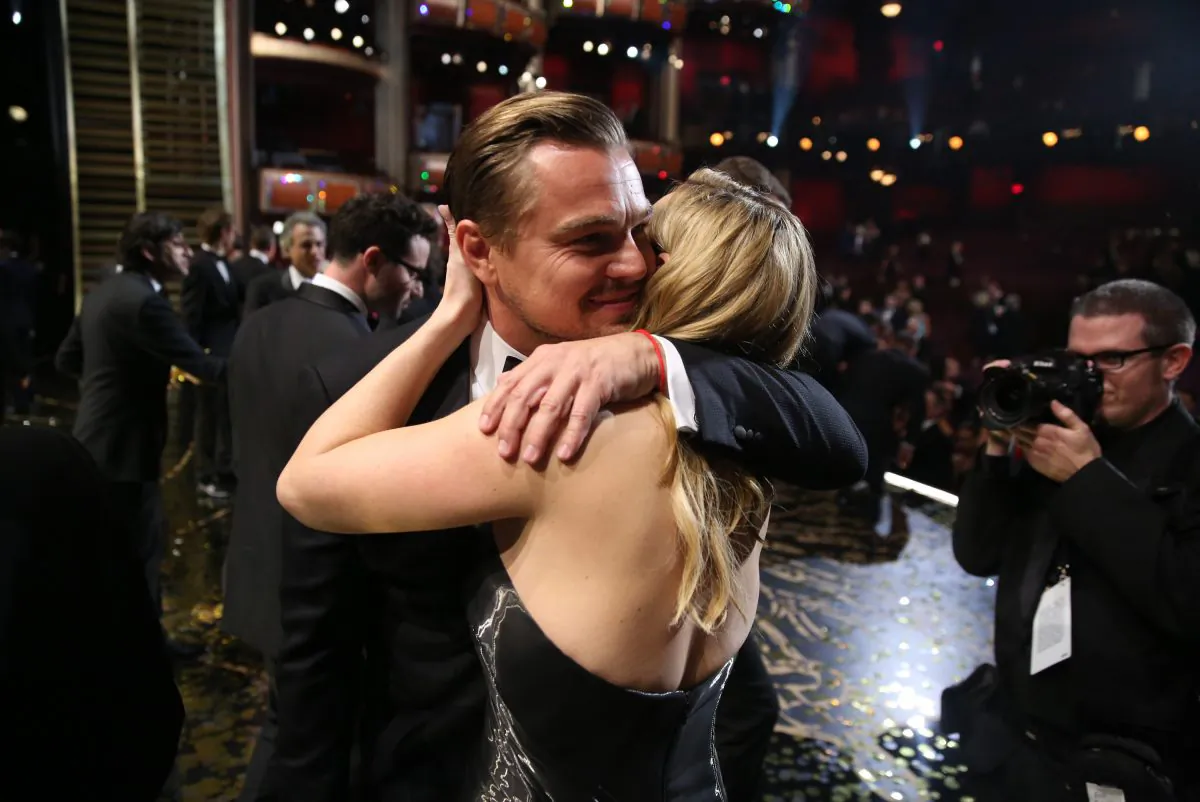 Leonardo DiCaprio, winner of the award for best actor in a leading role for "The Revenant" embraces Kate Winslet backstage at the Oscars on Sunday, Feb. 28, 2016, at the Dolby Theatre in Los Angeles. (Matt Sayles/Invision/AP)