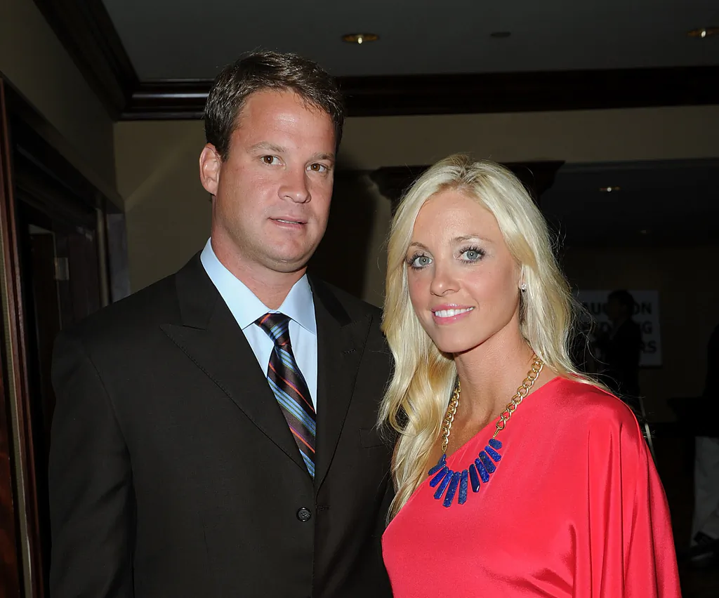 Lane Kiffin (L) and Layla Kiffin arrive at the 25th Anniversary Of Cedars-Sinai Sports Spectacular held at the Hyatt Regency Century Plaza Hotel on May 23, 2010 in Los Angeles, California. (Jason Merritt/Getty Images for Cedars-Sinai)