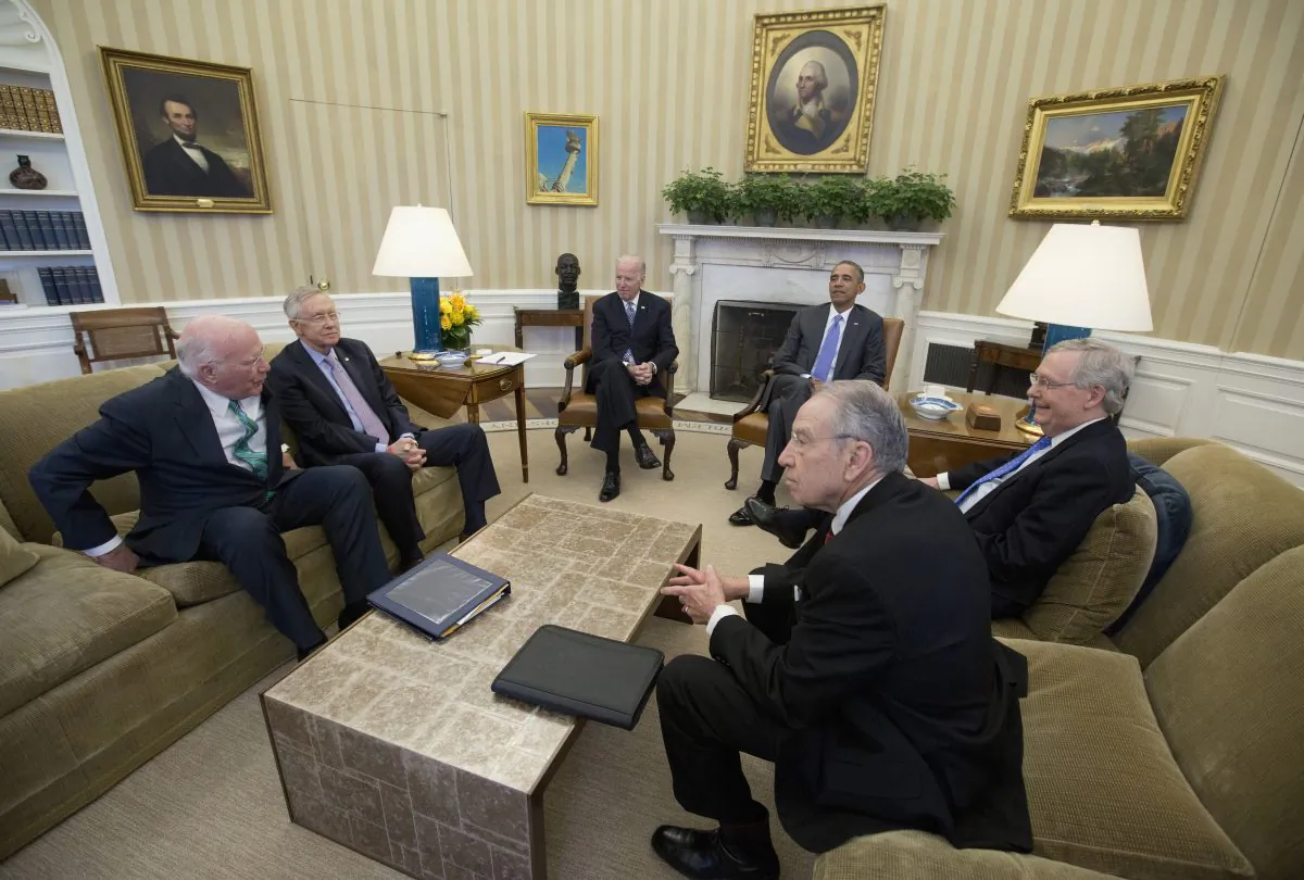 (L-R) Senate Judiciary Committee's ranking member Sen. Patrick Leahy (D-Vt.), Senate Minority Leader Sen. Harry Reid of Nev., Vice President Joe Biden, President Barack Obama, Senate Majority Leader Mitch McConnell of Ky., and Senate Judiciary Committee Chairman Sen. Chuck Grassley (R-Iowa) meet in the Oval Office of the White House in Washington, D.C., March 1, 2016, to discuss the vacancy in the Supreme Court. Senate Republican leaders are vowing to block the president's Supreme Court nominee, no matter who it is, with the hope of keeping the seat open for a Republican president to fill next year. (AP Photo/Carolyn Kaster)