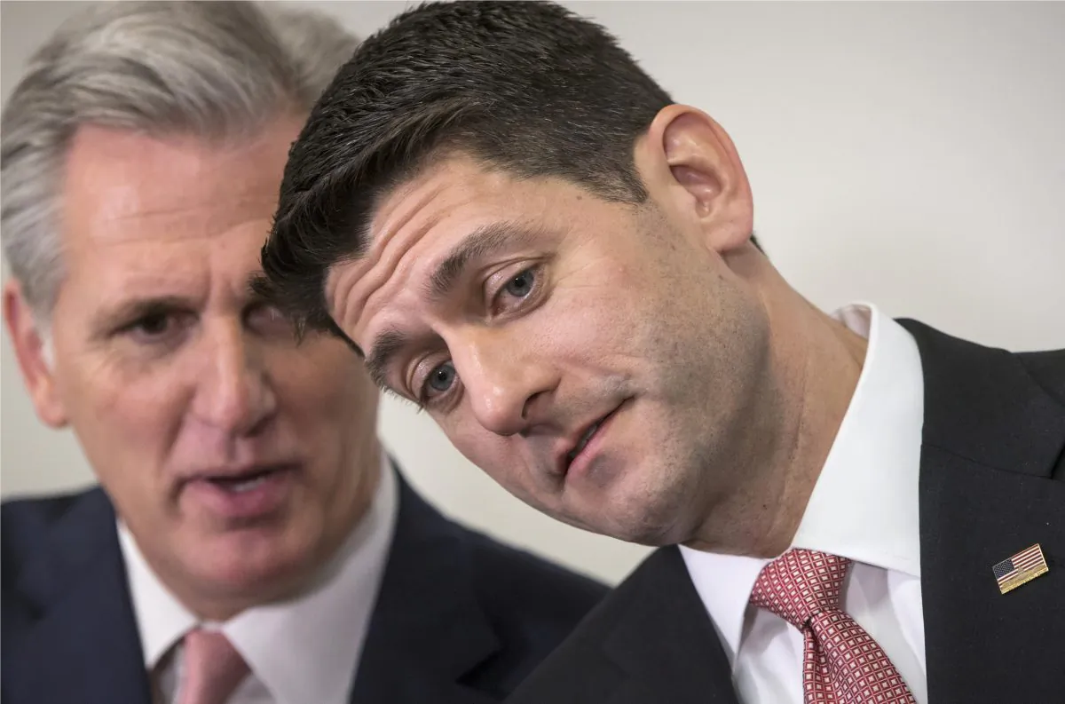 House Speaker Paul Ryan (R-Wis.) confers with House Majority Leader Kevin McCarthy (R-Calif.) before a news conference on Capitol Hill in Washington, D.C., on March 1, 2016. (AP Photo/J. Scott Applewhite)