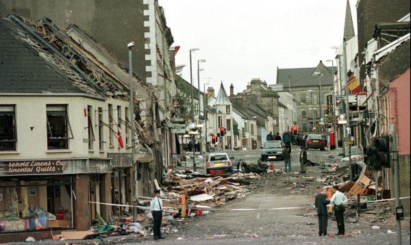 Royal Ulster Constabulary Police officers stand on Market Street, the scene of a car bombing in the centre of Omagh, Co Tyrone, 72 miles west of Belfast, Northern Ireland, on Aug. 15, 1998. Prosecutors say the case has collapsed against Seamus Daly the man charged with the murder of 29 people in Omagh in 1998, scene of the deadliest bombing in the history of the Northern Ireland conflict. (AP Photo/Paul McErlane)