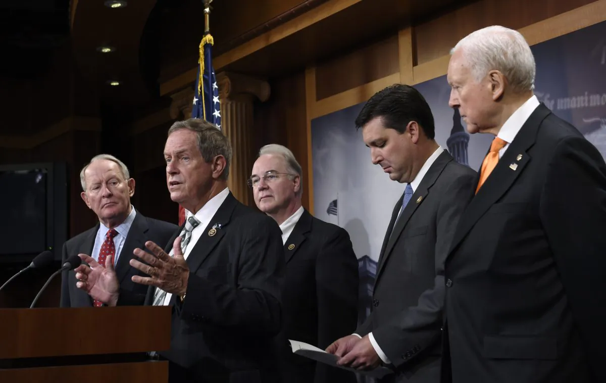 Rep. Joe Wilson (R-S.C.) (2L) speaks during a news conference on Capitol Hill in Washington, D.C., on July 27, 2015, where the Employee Rights Act (ERA) was discussed. Wilson is joined by (L-R) Sen. Lamar Alexander (R-Tenn.), Rep. Tom Price (R-Ga.), Rep. David Rouzer (R-N.C.), and Sen. Orrin Hatch (R-Utah). (AP Photo/Susan Walsh)