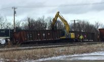 Crews Work to Clear NY Tracks Where 16 Freight Cars Derailed