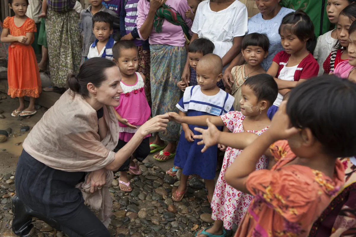 Angelina Jolie Pitt meets children during a visit to Ja Mai Kaung Baptist refugee camp in Myitkyina, Burma, on July 30, 2015. (Tom Stoddart/Getty Images Reportage/Maddox Jolie-Pitt Foundation via Getty Images)