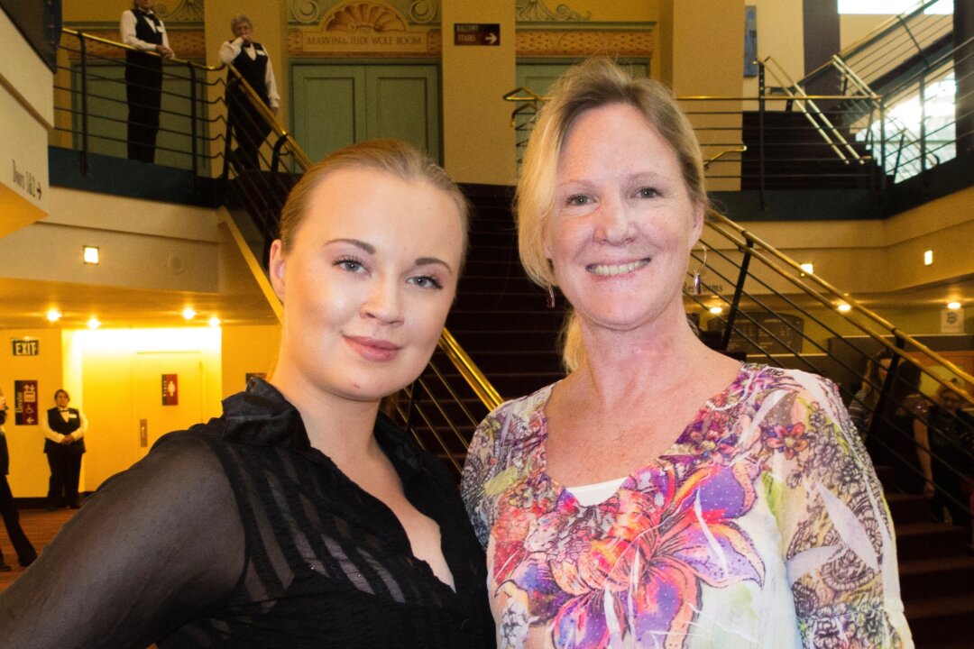 Sky Coplien and her mother, Tracy Vermillion, enjoy Shen Yun Performing Arts at The Buell Theatre, Denver, on March 6, 2016. (Alex Ma/Epoch Times) 