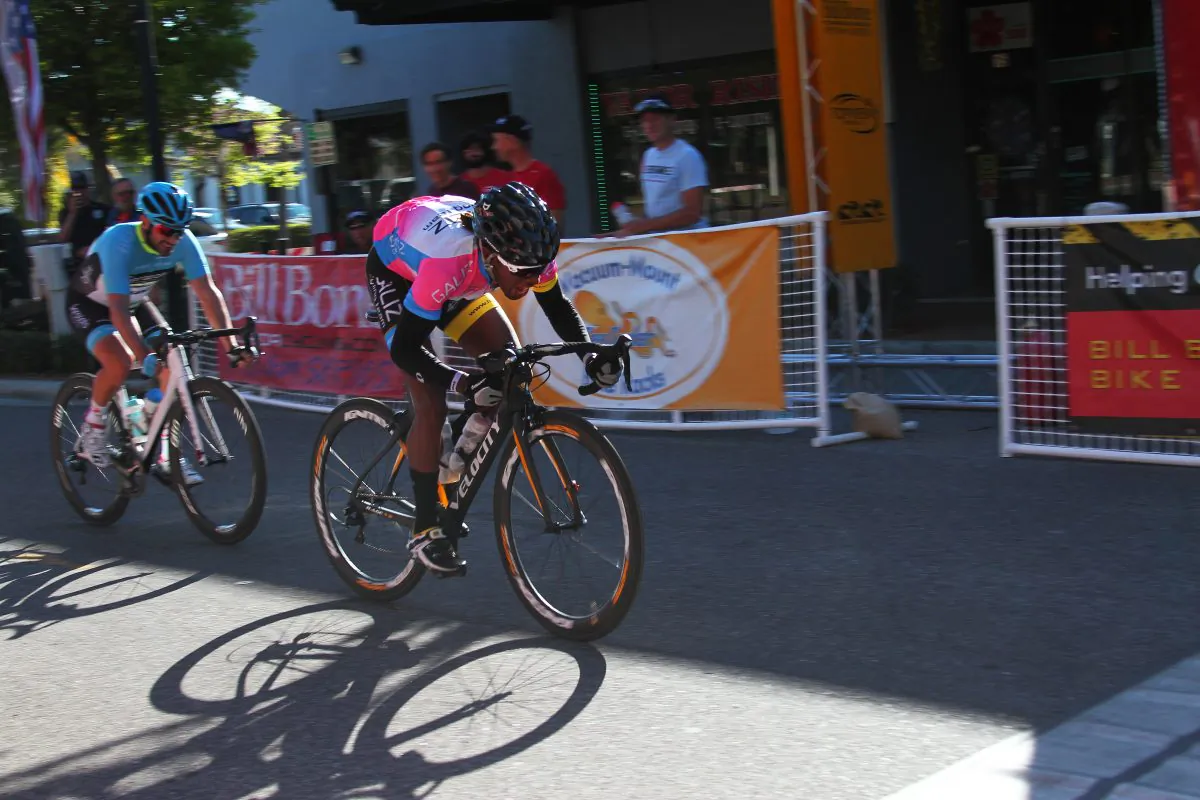 Oshane Williams beats Daniel Dowling to the finish line to win the Chain of Lakes Cycling Classic Pro 1/2 crit on Sunday, March 6, 2016. (Chris Jasurek/Epoch Times)
