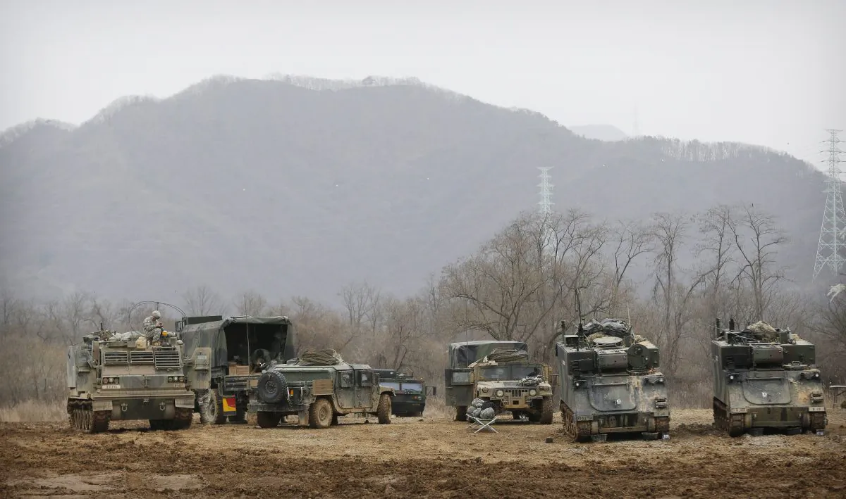 U.S. Army's armored vehicles take on a position during an annual exercise in Yeoncheon, near the border with North Korea, on March 7, 2016. (AP Photo/Ahn Young-joon, File)