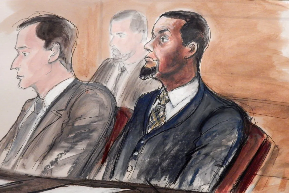 In this Feb. 24, 2016, courtroom file sketch, Tairod Nathan Webster Pugh (R) sits at the defense table with his attorney Zachary S. Taylor, during jury selection in a federal court in the Brooklyn borough of New York. Pugh, a U.S. Air Force veteran and former airplane mechanic charged with trying to join the Islamic State, was convicted by the jury on March 9, 2016. It was the first verdict to result from more than 70 cases the government has brought against U.S. citizens accused of trying to support the militant group. (AP Photo/Elizabeth Williams)